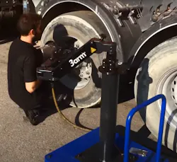 By placing the arm on a trolley cart with a compressor, the technician can easily move the tool around the vehicle and from station to station safely without the hazard of hoses trailing behind them. By placing the arm on a trolley cart with a compressor, the technician can easily move the tool around the vehicle and from station to station safely without the hazard of hoses trailing behind them.