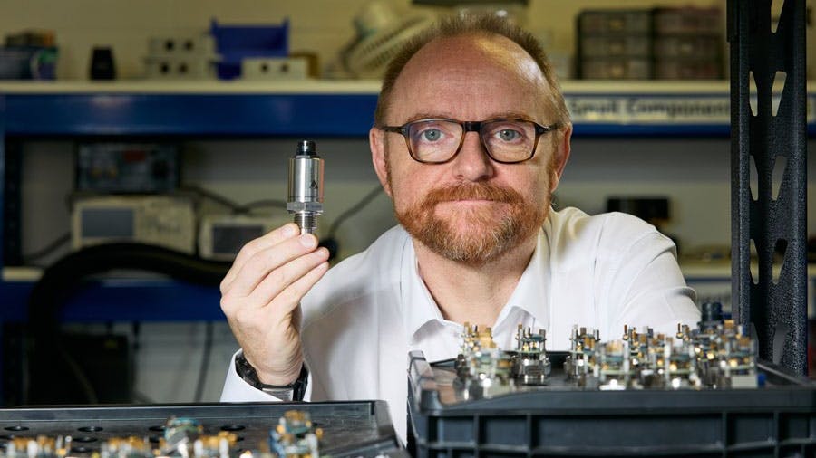 Tan Delta CEO Chris Greenwood showing off an oil monitoring sensor.