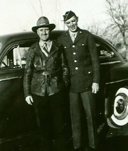 Chester England greeting his son, Pfc. Gene England, upon returning from World War II. Gene;s bravery earned him a Bronze Star at the Battle of Okinawa. Chester England greeting his son, Pfc. Gene England, upon returning from World War II. Gene;s bravery earned him a Bronze Star at the Battle of Okinawa.