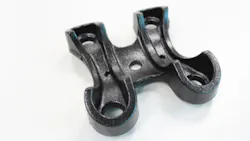 One view of the lower leafspring bracket that Gredersquos Reedsburg WI foundry is producing for the Chevrolet Silverado fullsize pickup One view of the lower leafspring bracket that Gredersquos Reedsburg WI foundry is producing for the Chevrolet Silverado fullsize pickup