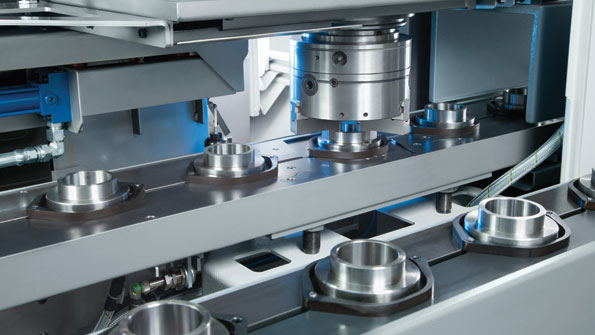 Highvolume highcomplexity finishing is supported by integrated automation systems as shown on this EMAG vertical turning system