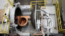 The 1metric ton copper crucible and melting chamber door of AMRC Castings centrifugal casting installation for titanium aerospace engine and structural components The 1metric ton copper crucible and melting chamber door of AMRC Castings centrifugal casting installation for titanium aerospace engine and structural components