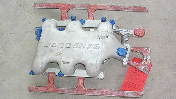 Once the coating procedure for a casting is determined it must be recorded for future reference One method is to mark a sample casting with paint Here unpainted areas have a standard coating the blue areas are trimmed and coated with graphite coating and red painted runners and risers are coated with isolative coating