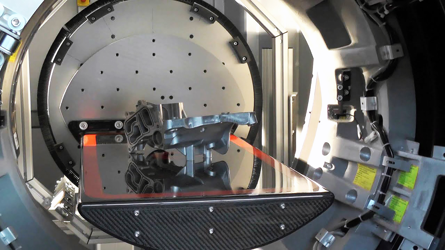 The speed|scan CT 64 scanner inspects a casting on a turntable by rotating the X-ray beam around the casting.