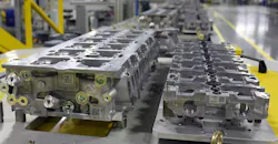 Cast aluminum cylinder heads on a rack at GM Flint Mich. engine plant. Cast aluminum cylinder heads on a rack at GM Flint Mich. engine plant.