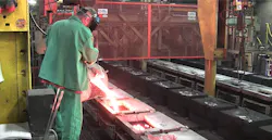 Pouring iron castings at Northern Iron & Machine, St. Paul, MN. Pouring iron castings at Northern Iron & Machine, St. Paul, MN.