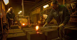 Filling sand molds at Smith Foundry, Minneapolis. Filling sand molds at Smith Foundry, Minneapolis.