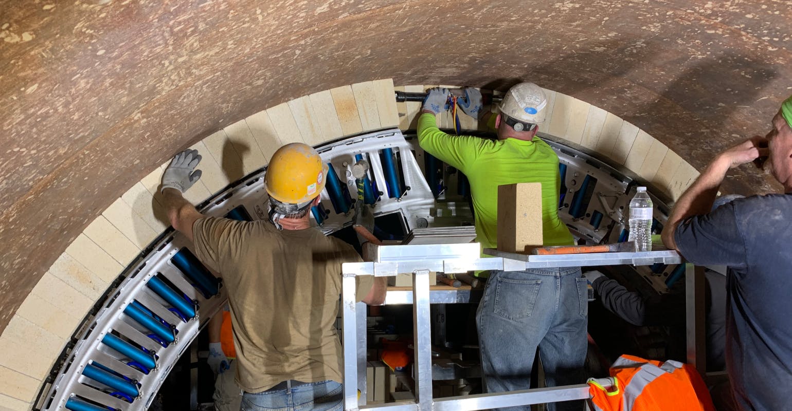 The bricking machine holds the refractory bricks firmly against the furnace shell and aligns the brickwork to avoid catastrophic failure. This also avoids falling debris and other dangers throughout the bricking process, which reduces the chance of injury.