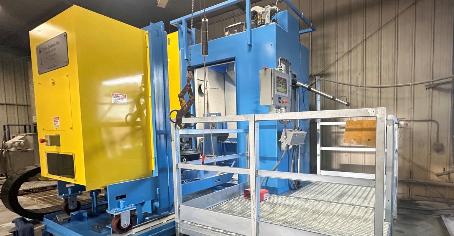 The Model TRX-1250CAM water-jet blasting machine at Franklin Precision Castings.