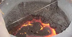 Severe slag build-up in the upper case of a channel furnace. Severe slag build-up in the upper case of a channel furnace.