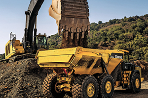 Choosing An Articulated Vs. Rigid Dump Truck | Grading & Excavation ...