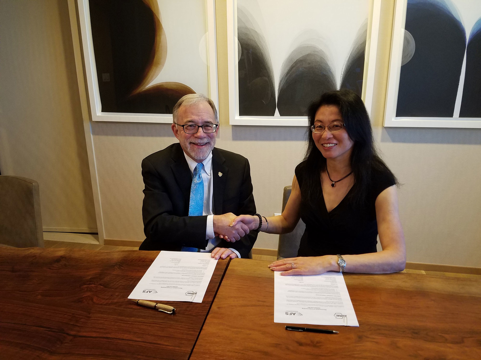 ASHRAE President Tim Wentz and American Filtration and Separations Society Chair Christine Sun