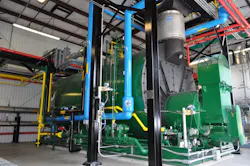 One of the three new gas-fired, 900-BHP fire-tube boilers installed at Alliance One. One of the three new gas-fired, 900-BHP fire-tube boilers installed at Alliance One.