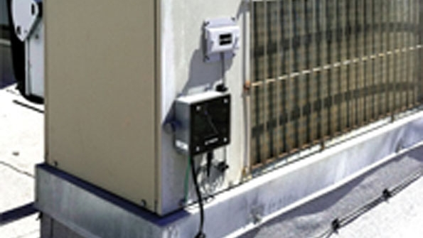 A cellular HVAC monitor on one of Buxtonrsquos rooftop air conditioners