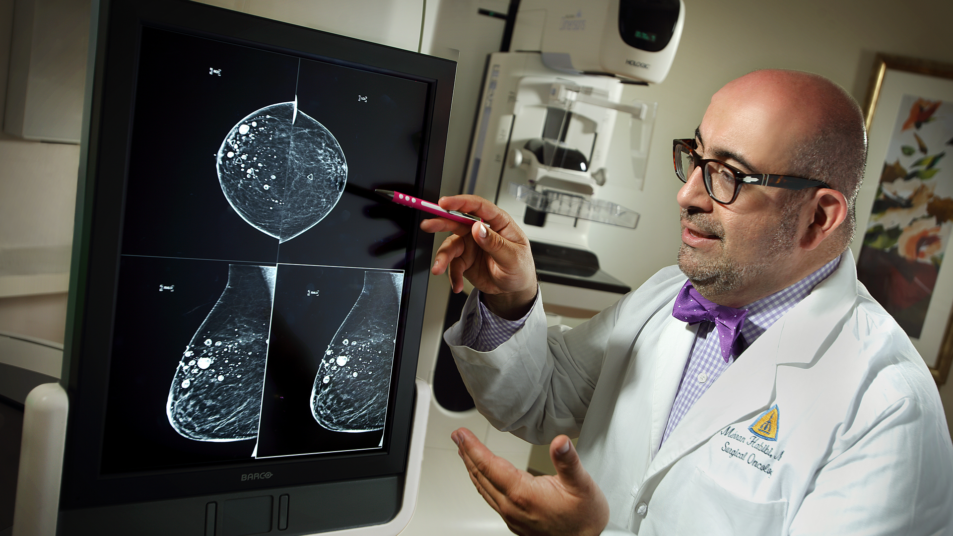 Dr. Mehran Habibi, Medical Director of the Johns Hopkins Breast Center, looking at a breast X-ray.
