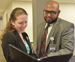 Susan Steuer & Chinnaiah Naidu review training materials Susan Steuer & Chinnaiah Naidu review training materials