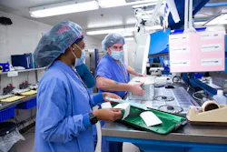 Tech II Shellie Pearsall (left) and Instrument Coordinator Thomas Haley prepare a tray for sterilization. Tech II Shellie Pearsall (left) and Instrument Coordinator Thomas Haley prepare a tray for sterilization.