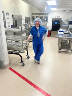 Ann & Robert H. Lurie Children’s Hospital Shift SPD Supervisor Cherie Dominguez standing behind the red line. Ann & Robert H. Lurie Children’s Hospital Shift SPD Supervisor Cherie Dominguez standing behind the red line.