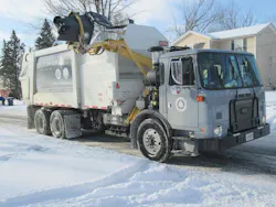 One of three hydraulic hybrid refuse trucks collects municipal waste in Oberlin, Ohio. Photo by Lori Sprosty. One of three hydraulic hybrid refuse trucks collects municipal waste in Oberlin, Ohio. Photo by Lori Sprosty.