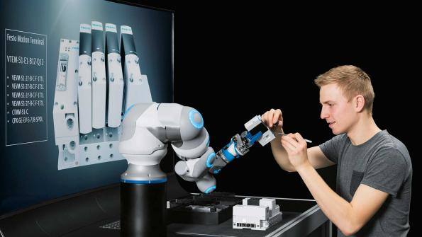 The BionicCobot emulates movements of a human arm and acheives gentle movements to operate safely with human workers Courtesy of Festo