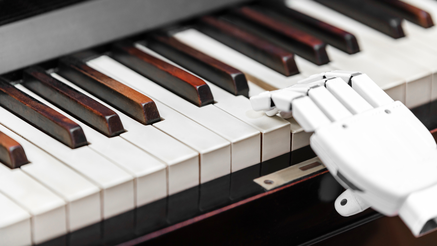 Robot playing a piano