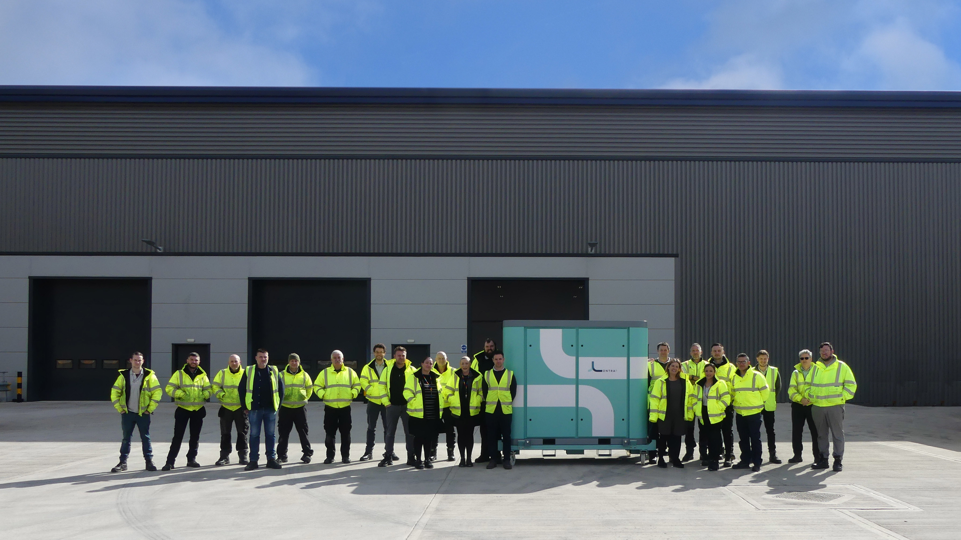 Lontra&rsquo;s manufacturing team alongside the first LP2 Blade Blower unit to be produced at the company's new smart factory.
