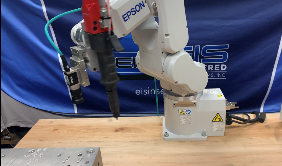 A robotic arm equipped with the correct tooling makes for fast, accurate installation of the EIS Pull Plug.