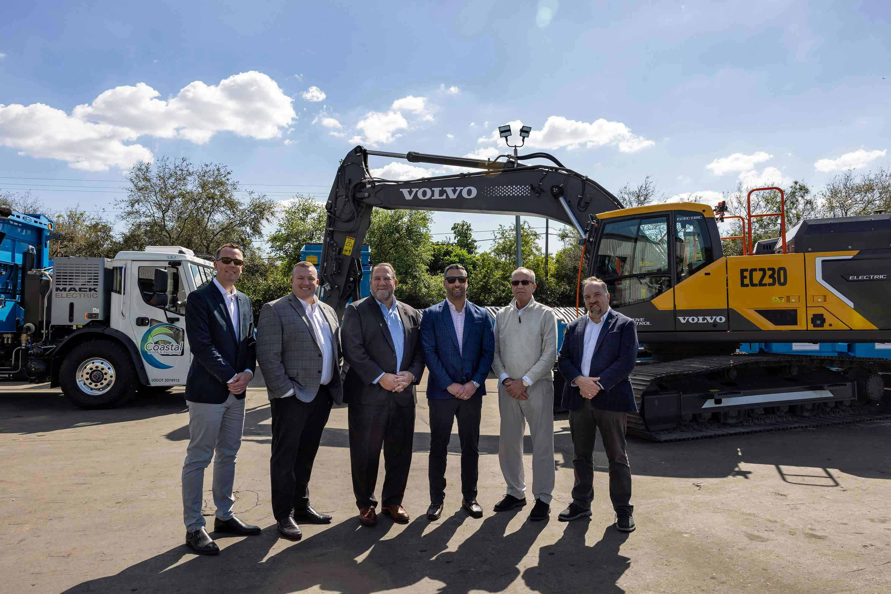 Volvo Construction Equipment and Mack Trucks, both Volvo Group companies, recently delivered on- and off-road electric equipment to Florida-based Coastal Waste & Recycling to help the company achieve its sustainability goals. Pictured left to right: Martin Mattsson, director, Key Account Sales, Waste & Recycling, Volvo CE; Tyler Ohlmansiek, Mack e-mobility sales director; Jonathan Randall, president of Mack Trucks North America; Brendon Pantano, CEO, Coastal Waste & Recycling; Dennis Pantano, COO, Coastal Waste & Recycling; Ray Gallant, head of Sustainability and Productivity, Volvo CE.