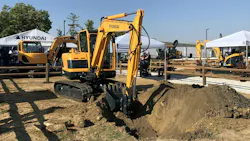 An excavator demo at The Utility Expo An excavator demo at The Utility Expo
