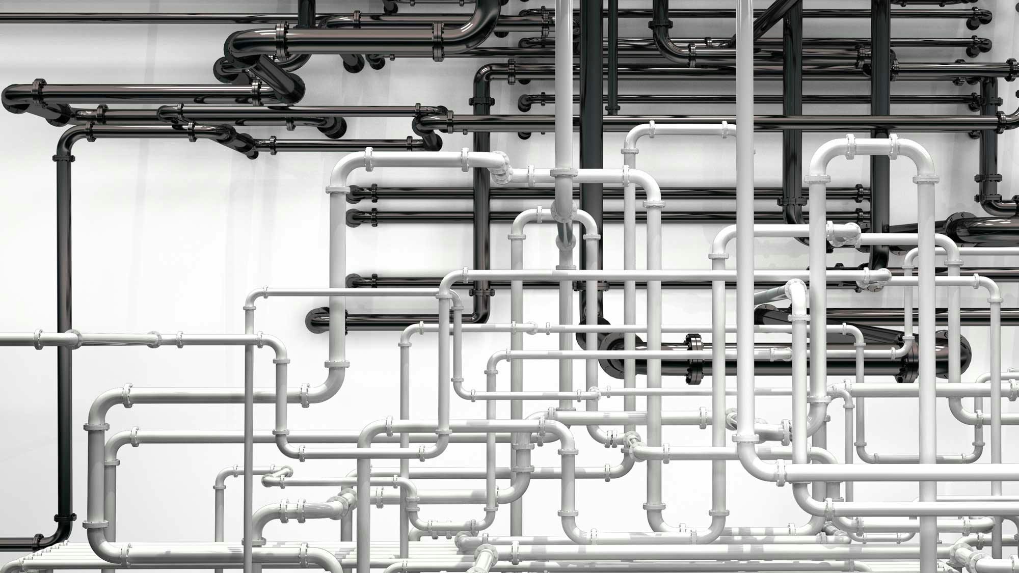 Pipes going in various directions to deliver compressed air to pneumatic systems