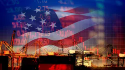An American flag superimposed over a shipping yard An American flag superimposed over a shipping yard