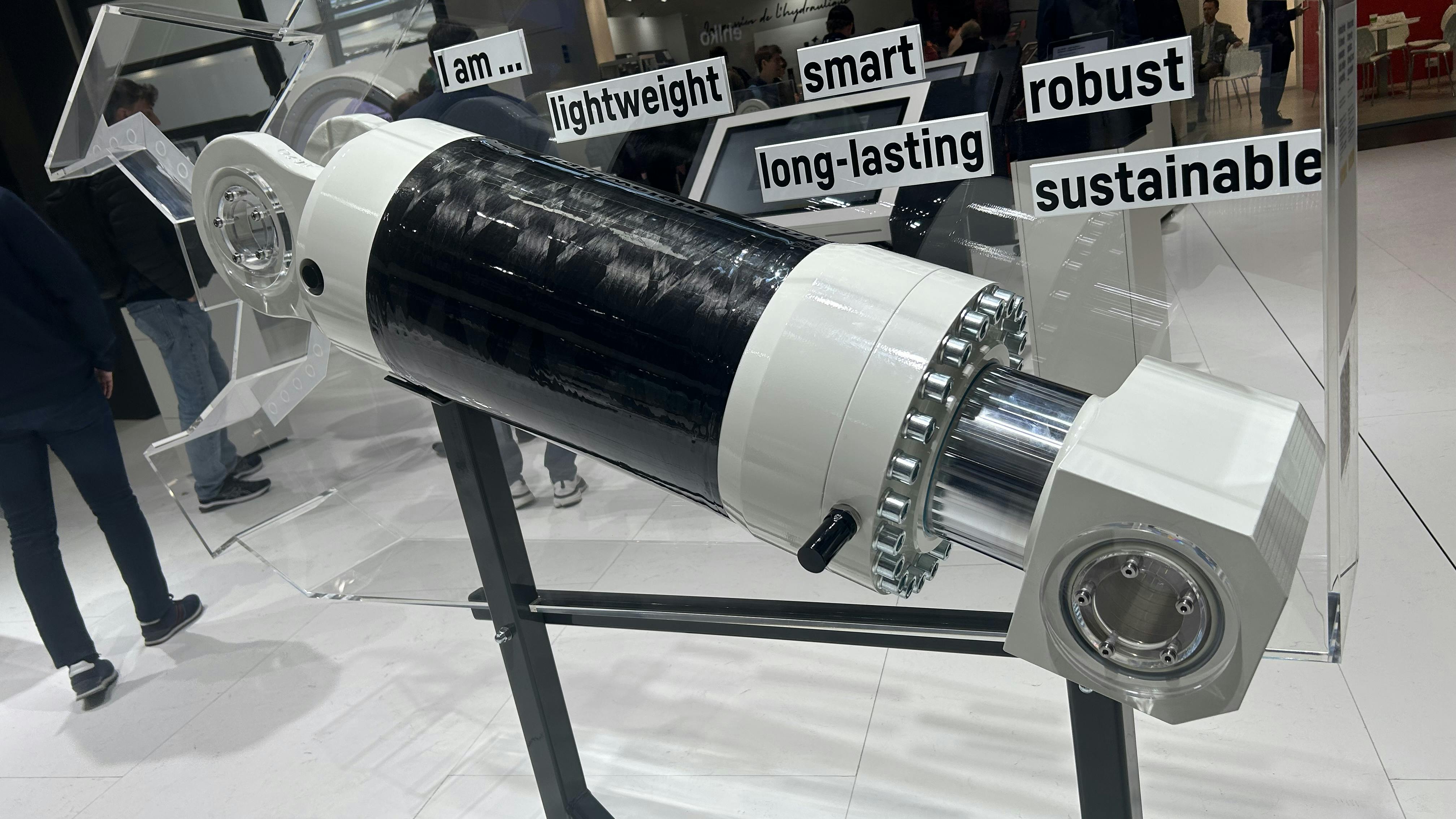 The Liebherr carbon fiber hydraulic cylinder on display at bauma 2025