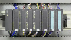 A PLC and other networking componentry in an industrial setting A PLC and other networking componentry in an industrial setting