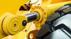 A close up view of a hydraulic cylinder on a piece of construction equipment A close up view of a hydraulic cylinder on a piece of construction equipment