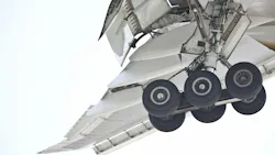 A close up view of an airplane's landing gear A close up view of an airplane's landing gear