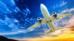 Underside view of an airplane flying in the sky Underside view of an airplane flying in the sky