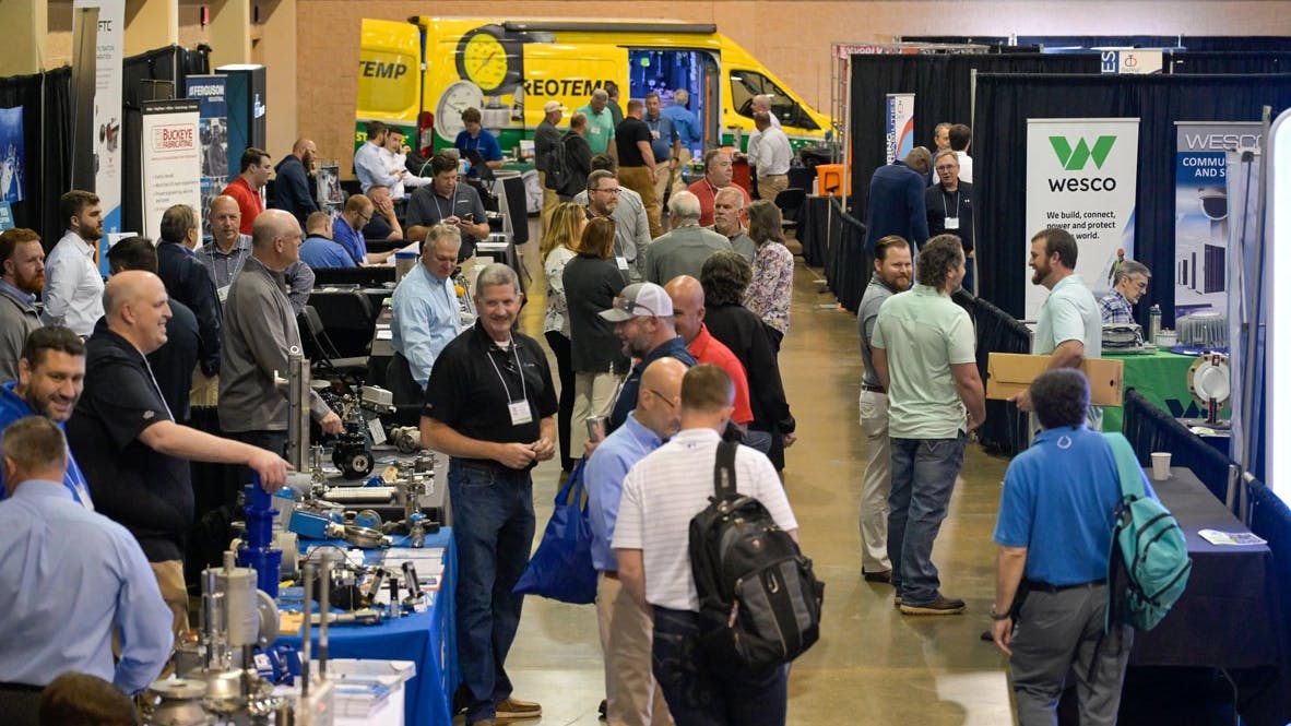 Exhibitors showcasing products at eChem Expo