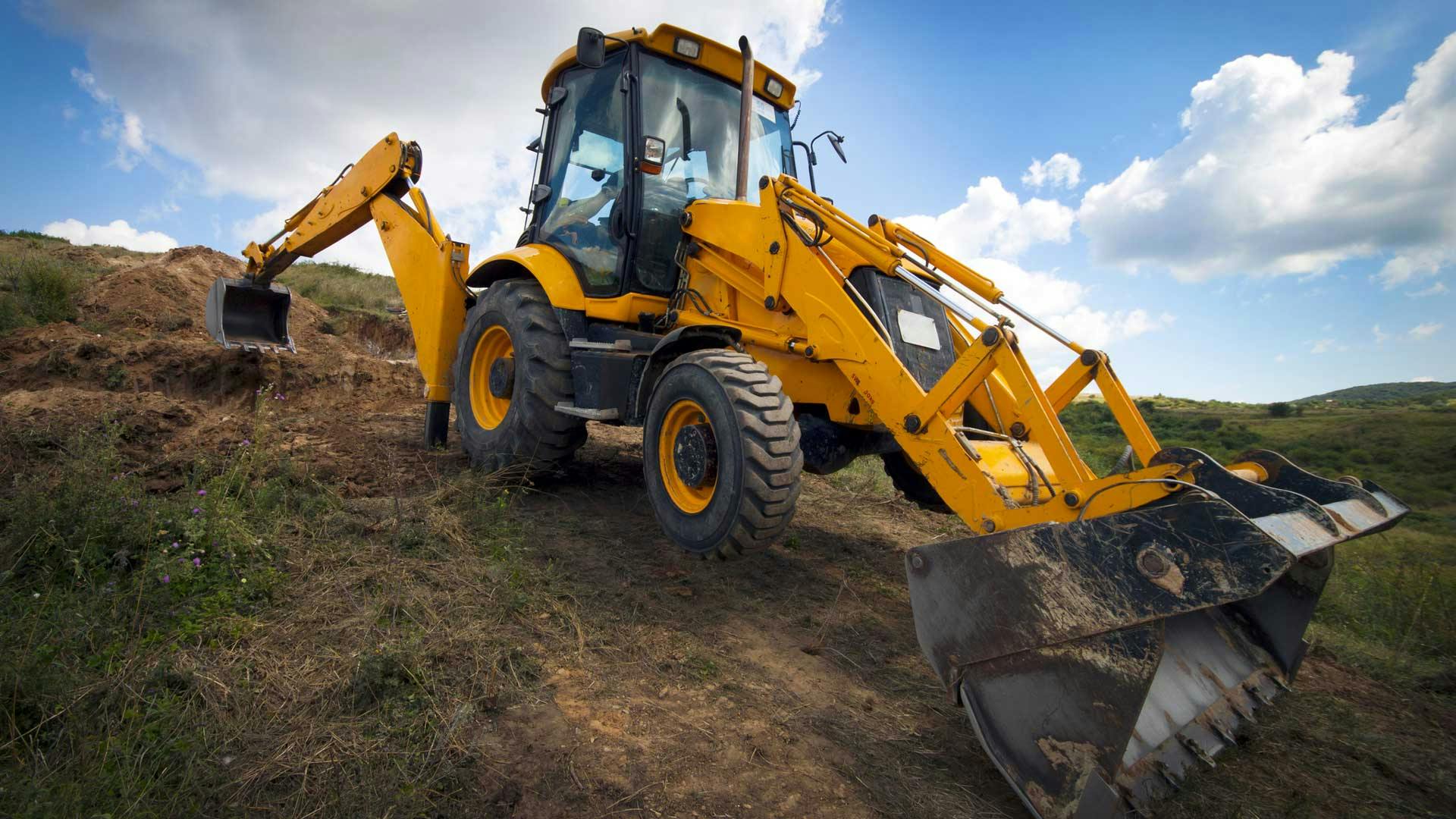 Backhoe Working in the Dirt