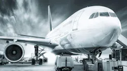 Commercial Aircraft with Support Equipment Around It Commercial Aircraft with Support Equipment Around It