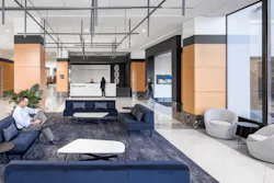 The newly renovated lobby features a strategic deployment of black and white highlights that modernizes the existing wood paneling. Comfortable seating gives guests and tenants’ employees a place to land. The newly renovated lobby features a strategic deployment of black and white highlights that modernizes the existing wood paneling. Comfortable seating gives guests and tenants’ employees a place to land.