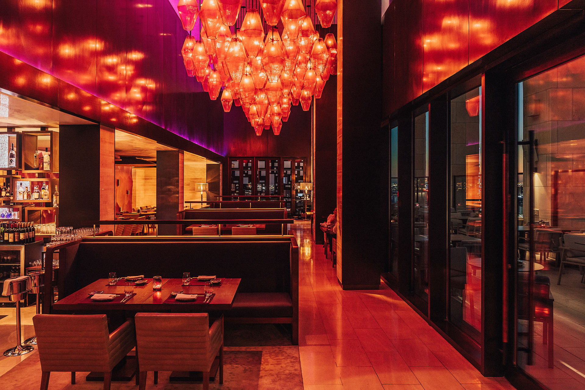 Sora by night is truly an experience as the bay and skyline sparkle below and jewel-shaped and toned lighting glow from above.