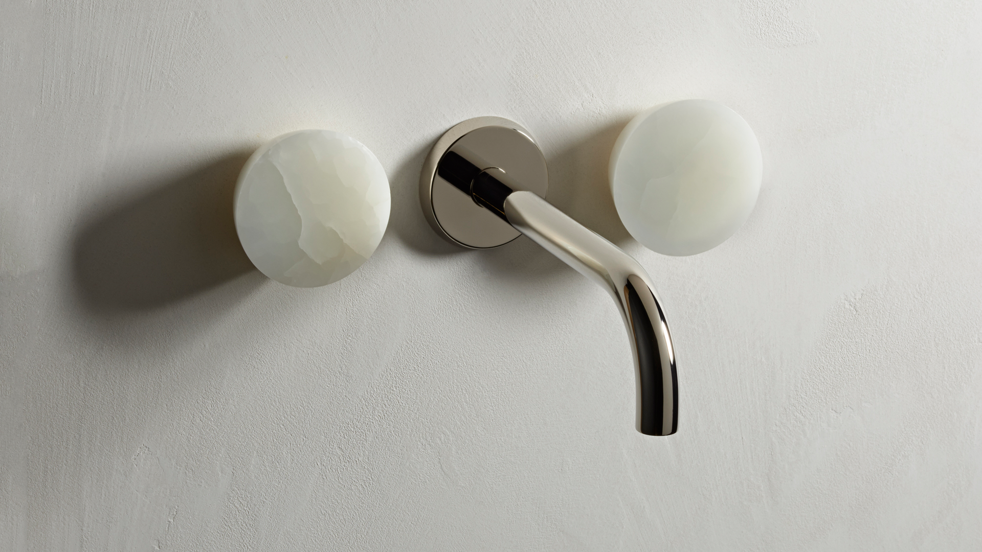 Zen faucet handle in white.