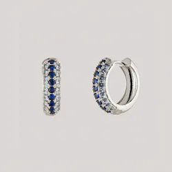 Bonheur Jewelry's Addison Huggie hoop set in royal blue. Bonheur Jewelry's Addison Huggie hoop set in royal blue.