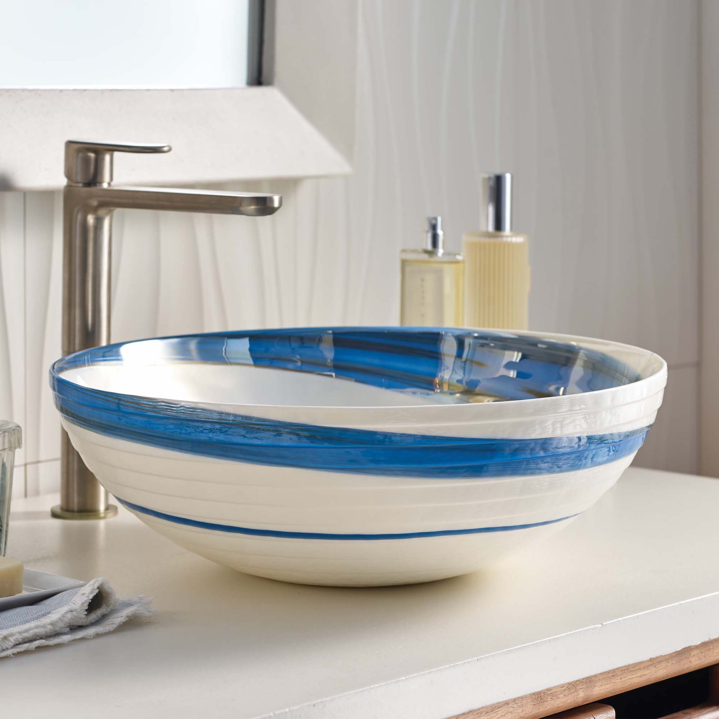 The Roma glass vessel sink in Marina finish.