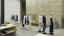 Poured concrete walls serve as the perfect backdrop to help just a sampling of pieces truly pop at Theory Hudson Yards in New York City. Poured concrete walls serve as the perfect backdrop to help just a sampling of pieces truly pop at Theory Hudson Yards in New York City.