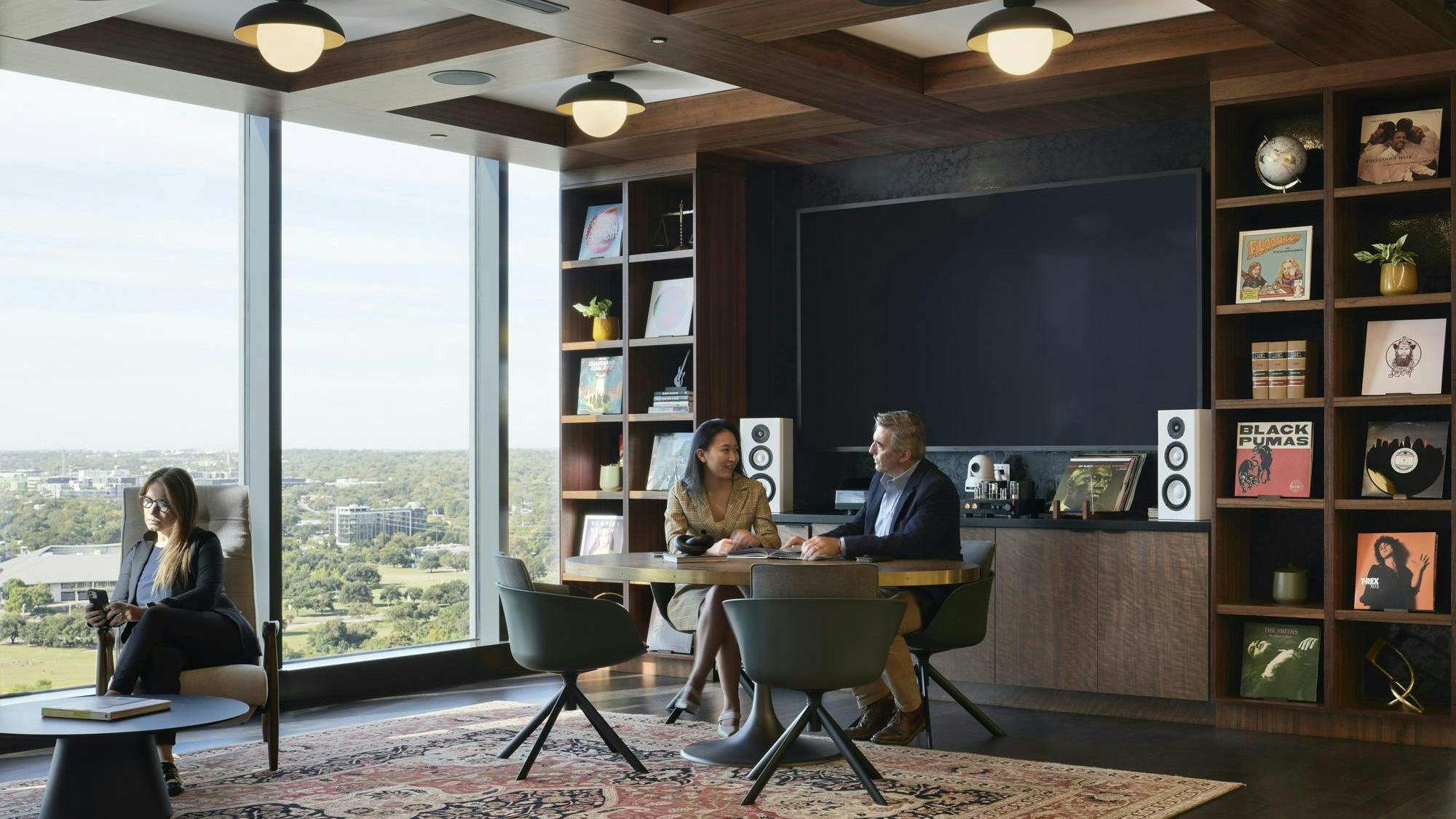 This hospitality space features views of the city and is decorated with books and old-fashioned records of local musicians, celebrating Austin&rsquo;s vibrant music scene.