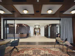 Sophisticated and welcome, the law firm’s entryway greets employees and clients with locally referenced materials like wood, stone and dark metals. Sophisticated and welcome, the law firm’s entryway greets employees and clients with locally referenced materials like wood, stone and dark metals.