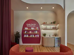 At this Culver City, Calif., location, the living room/waiting area is designed with soft white with pink undertone walls, hot pink accents, and dramatic plum-colored curtains. At this Culver City, Calif., location, the living room/waiting area is designed with soft white with pink undertone walls, hot pink accents, and dramatic plum-colored curtains.