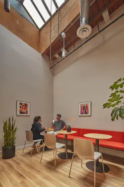 Heavy timber trusses and a wood ceiling add warmth to the space while a skylight bounces light deep into this breakroom area. Heavy timber trusses and a wood ceiling add warmth to the space while a skylight bounces light deep into this breakroom area.