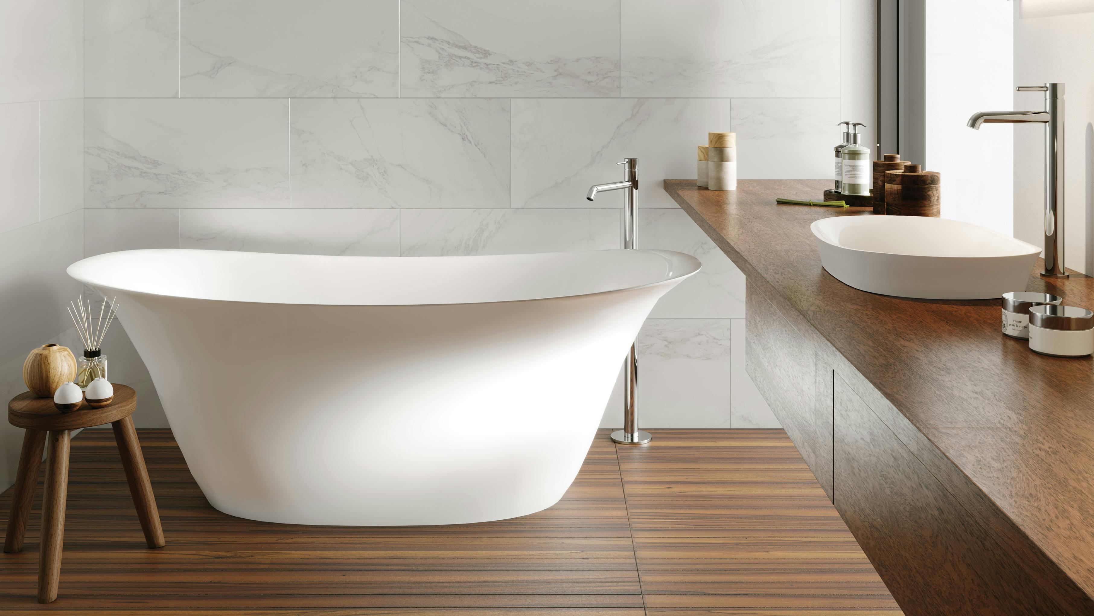 Maricela bathtub is a contemporary double slipper tub.